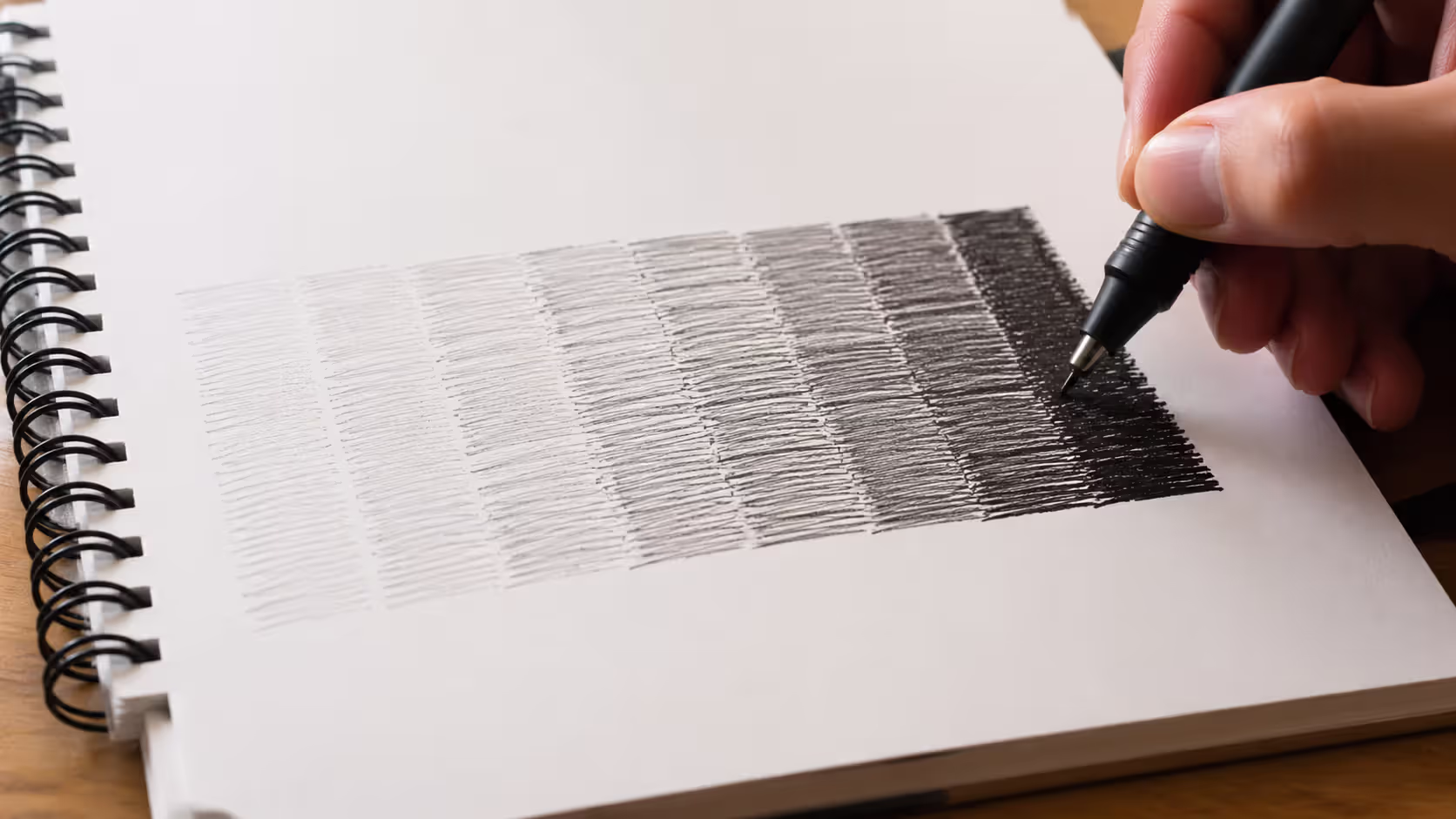 Parallel lines create perceived gray tones