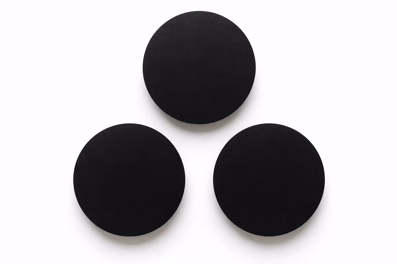negative space triangle formed between three circles layout