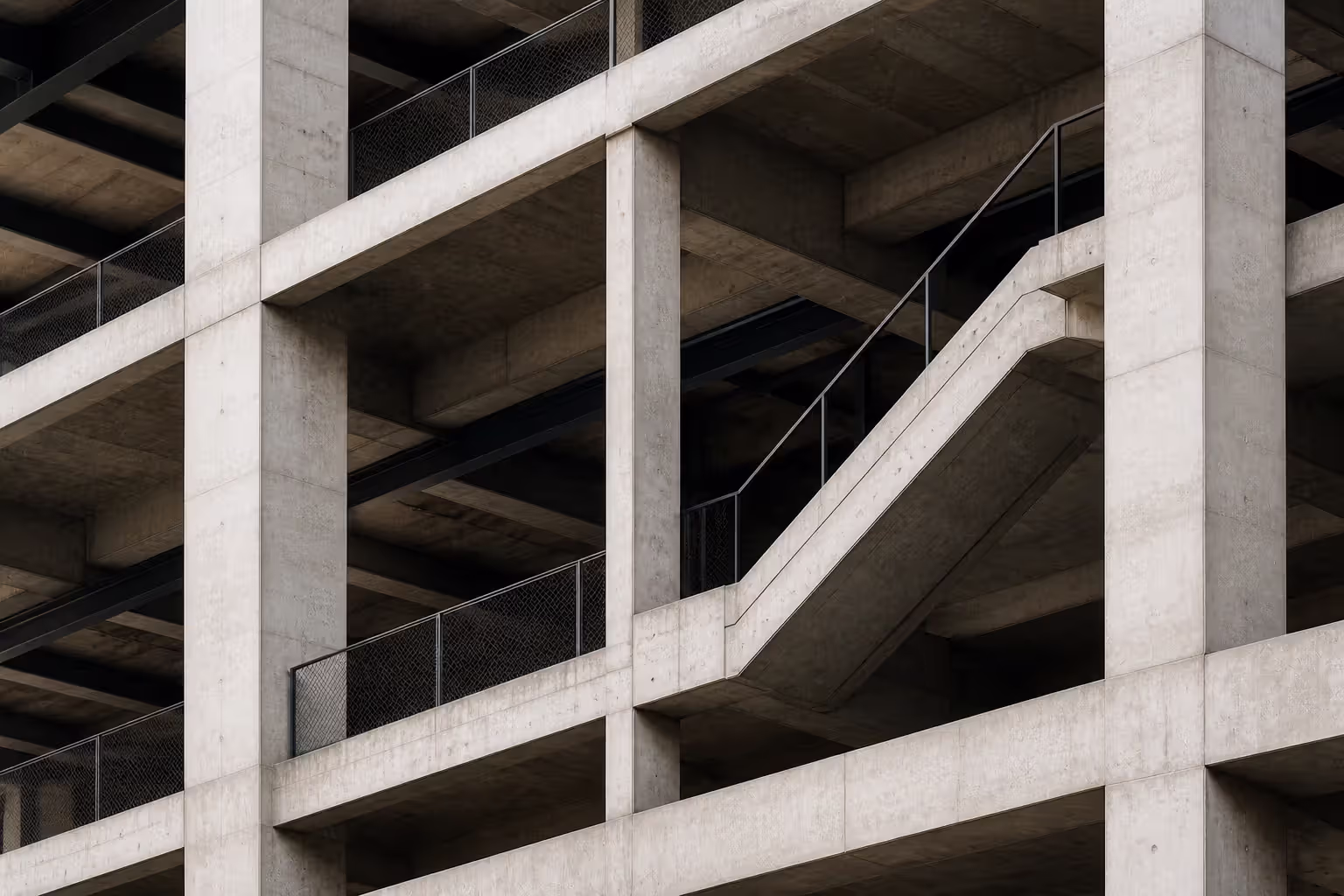 exposed concrete and steel structure showing material honesty